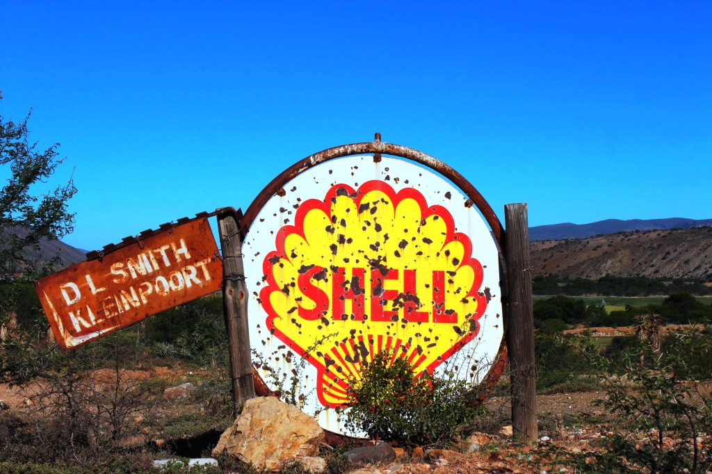 A rusty sign points to a now defunct Shell petrol station in the Karoo CStefan Cramer